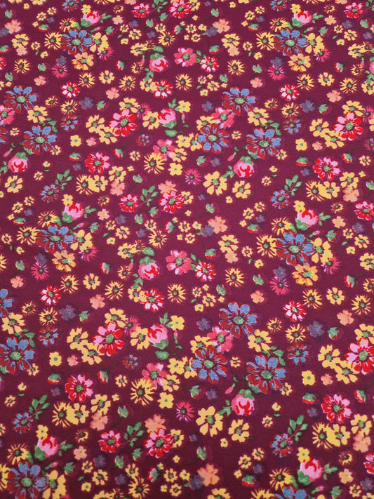 Soft touch polyester flower plum print  55" wide - sold by the metre